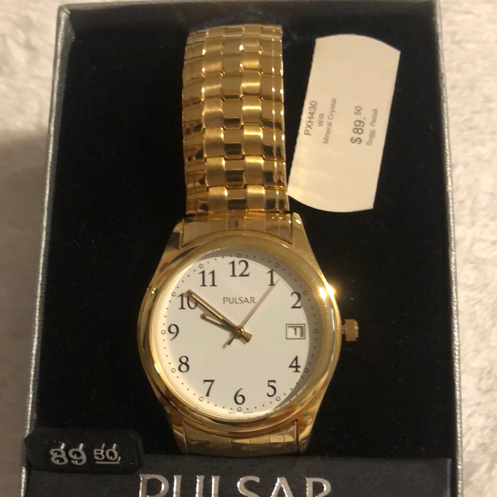 Pulsar Gold Timepiece With White Face